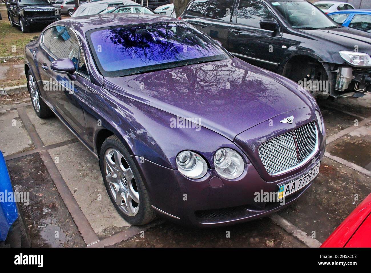 Ukraine, Kiev - April 3, 2015. Purple Bentley Continental in the ciry Stock Photo