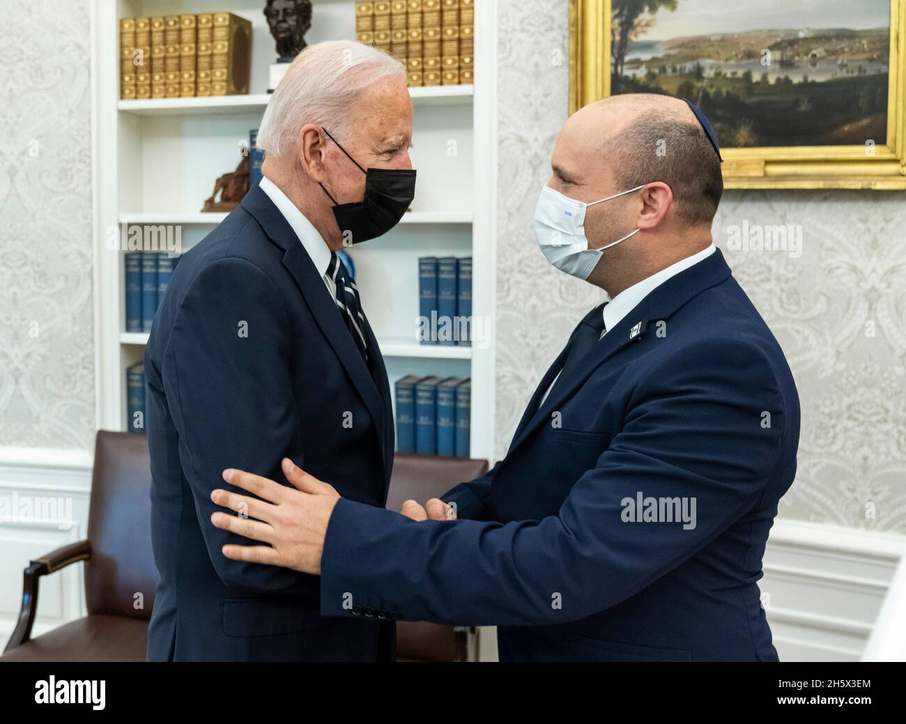 Washington, United States. 27 August, 2021. U.S. President Joe Biden welcomes Israeli Prime Minister Naftali Bennett, right, prior to their bilateral meeting in the Oval Office of the White House August 27, 2021 in Washington, D.C. Credit: Adam Schultz/White House Photo/Alamy Live News Stock Photo