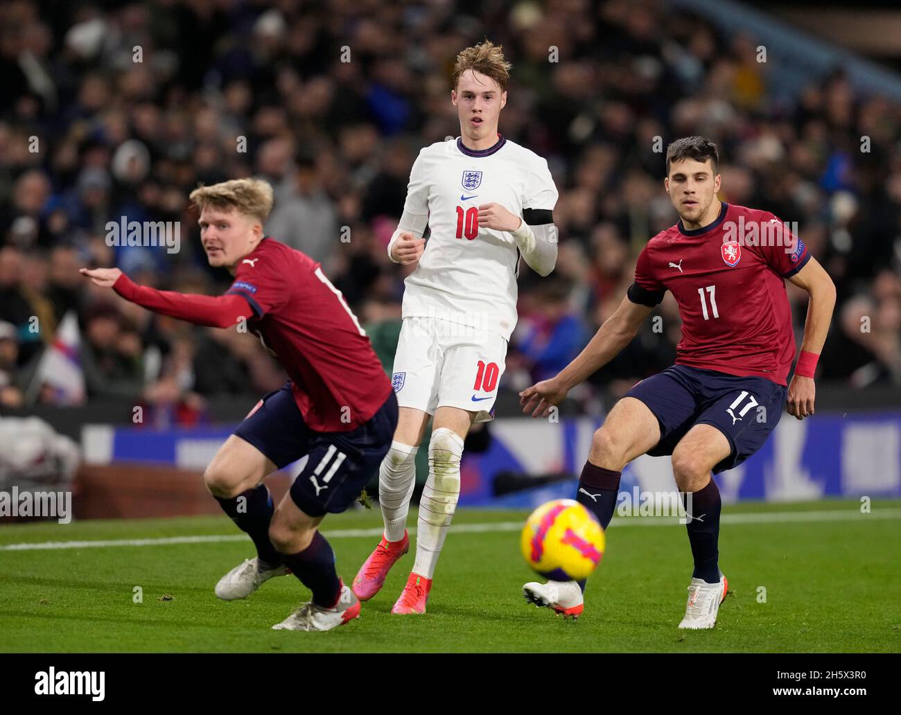 Burnley, UK. 11th November 2021. Cole Palmer of England passes through two players  during the UEFA Euro Under-21 Qualifying match at Turf Moor, Burnley. Picture credit should read: Andrew Yates / Sportimage Credit: Sportimage/Alamy Live News Stock Photo