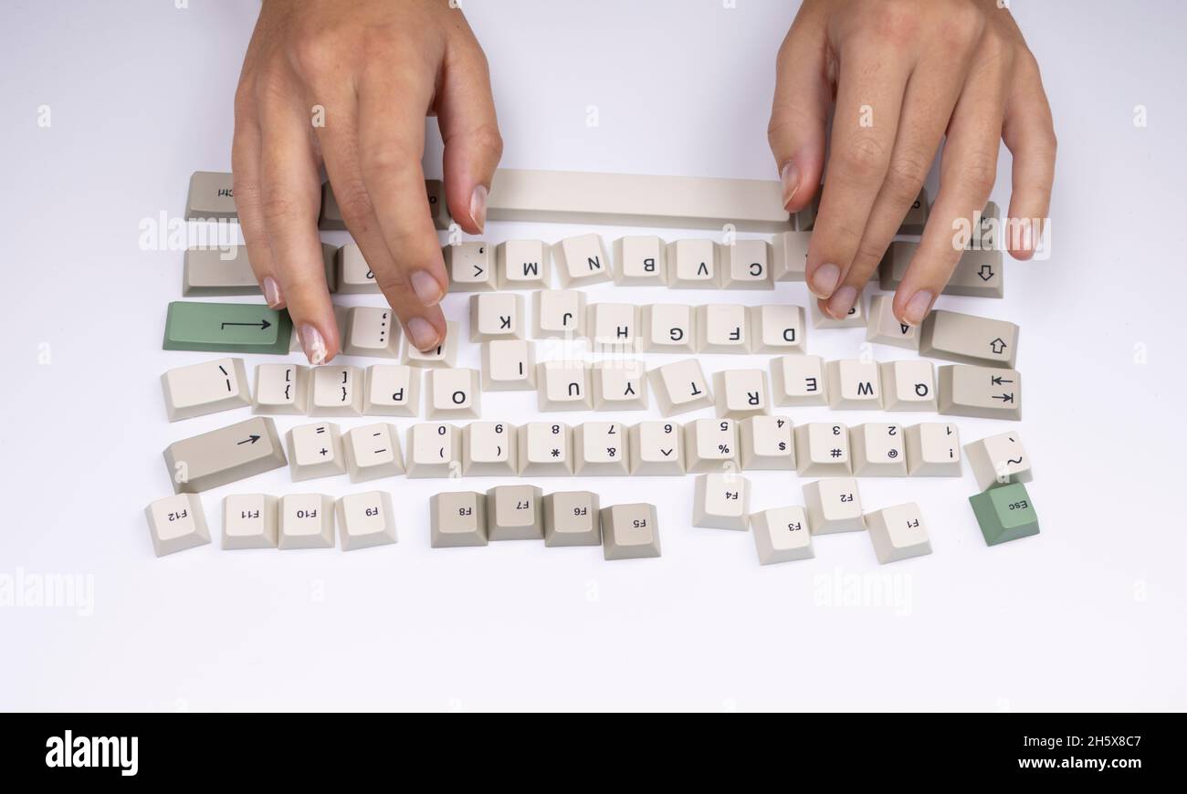 loose keyboard keys with hands typing Stock Photo Alamy