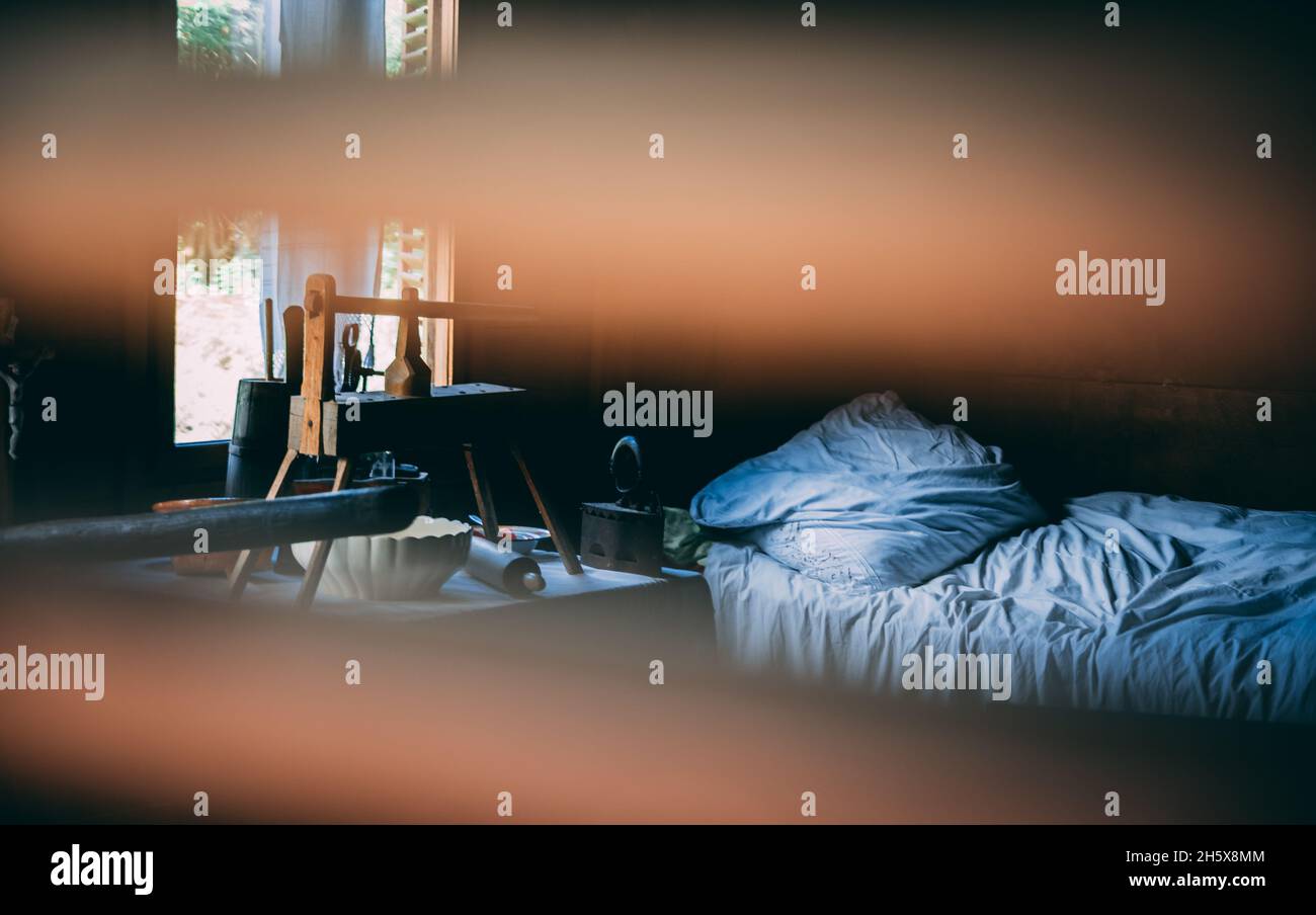 Shallow focus of a messy bedroom view from the window Stock Photo - Alamy