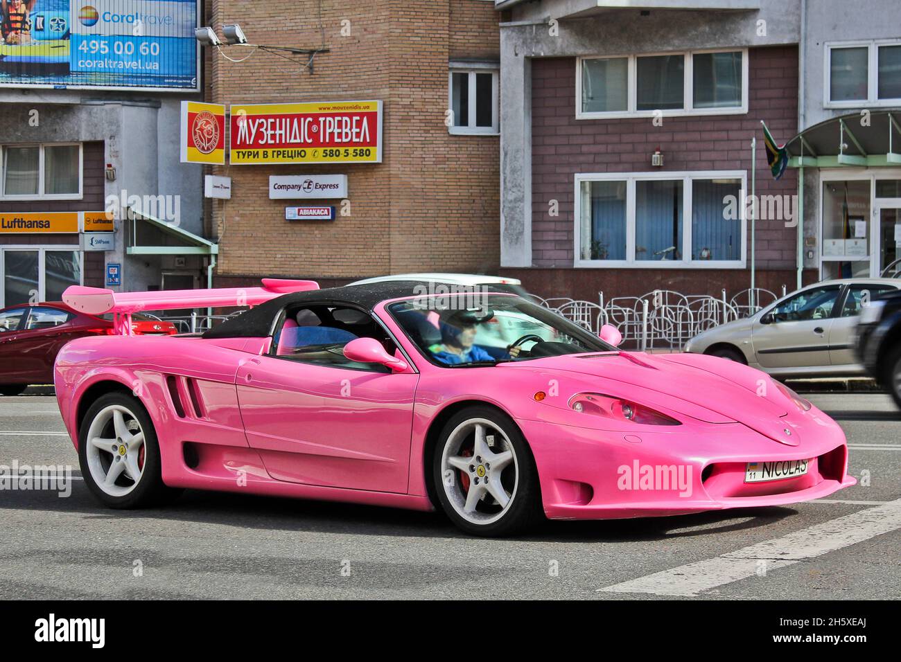 Kiev, Ukraine - April 18, 2015: Pink exclusive supercar Ferrari Modena F360 Spider Sbarro GT8. Tuning car Stock Photo