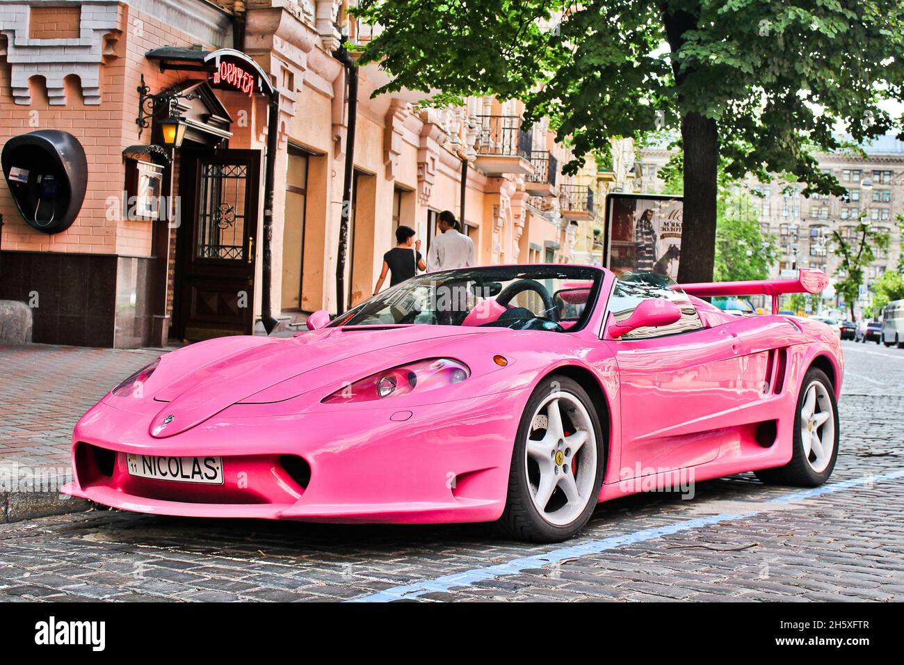 Kiev, Ukraine - June 1, 2013: Pink exclusive supercar Ferrari Modena F360 Spider Sbarro GT8. Tuning car Stock Photo