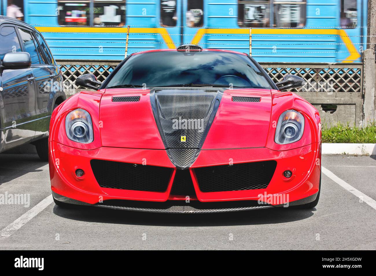 Kiev, Ukraine - July 30, 2011: Ferrari 599 GTB Fiorano Stallone Mansory in the city. Tuning supercar Stock Photo