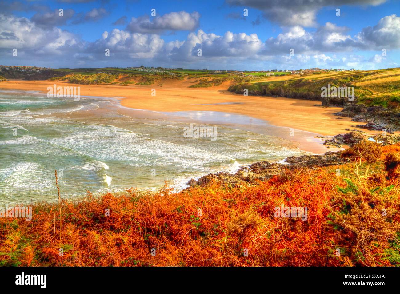 Beautiful colourful autumn colours English beach and coast Crantock bay North Cornwall England UK Stock Photo
