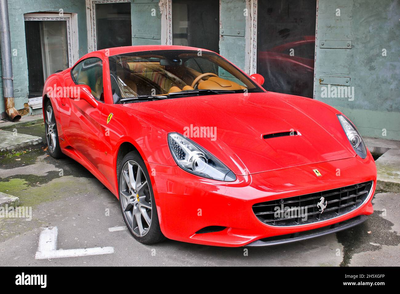 Kiev, Ukraine - April 26, 2015: Red Ferrari California in the city Stock Photo