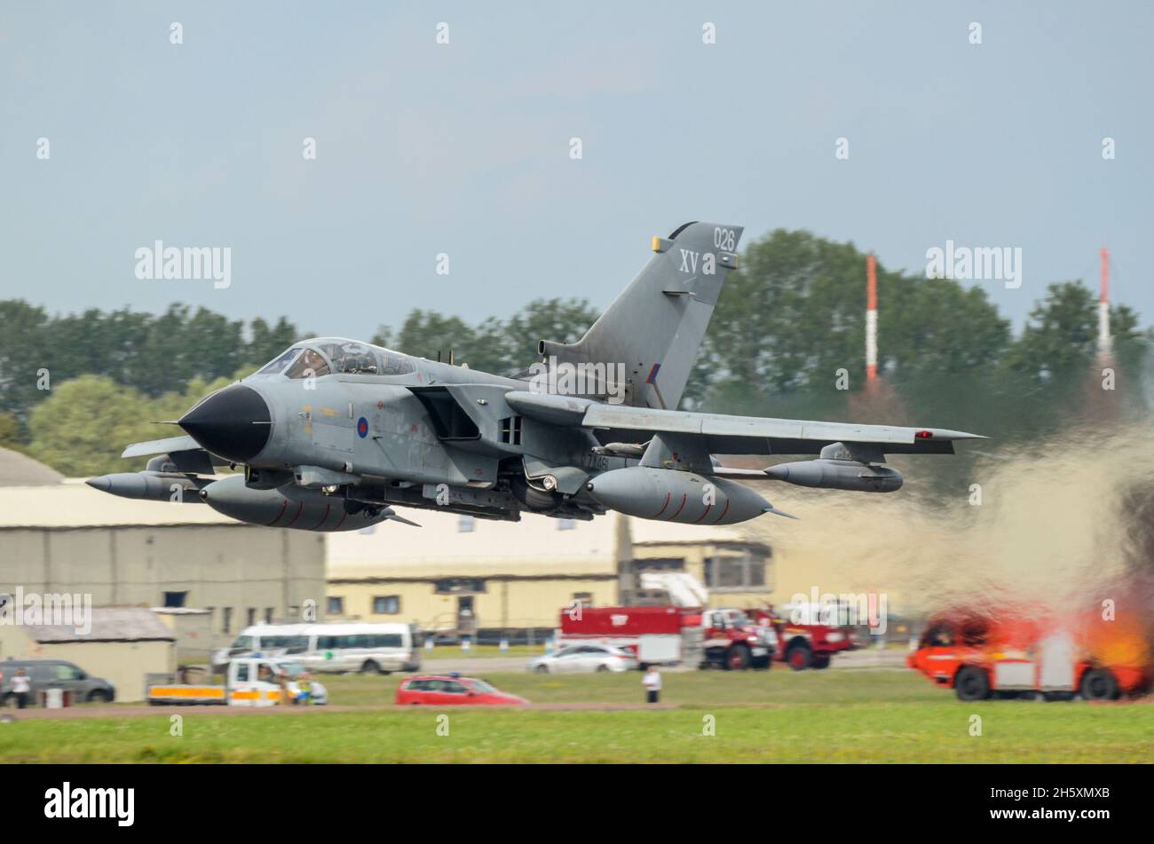 Royal Air Force Panavia Tornado GR4 fighter bomber jet plane keeping low after take off at Royal International Air Tattoo, RAF Fairford airshow Stock Photo