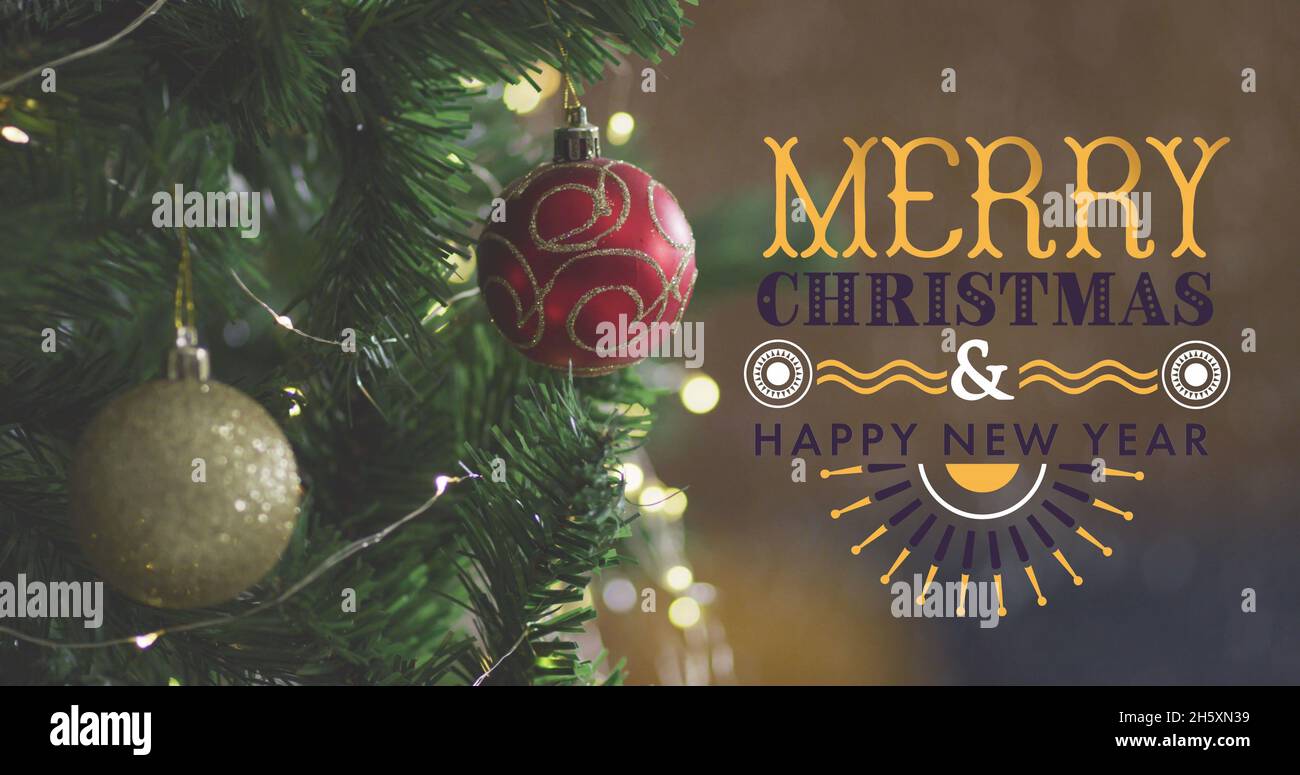 Image of merry christmas text over christmas tree Stock Photo - Alamy
