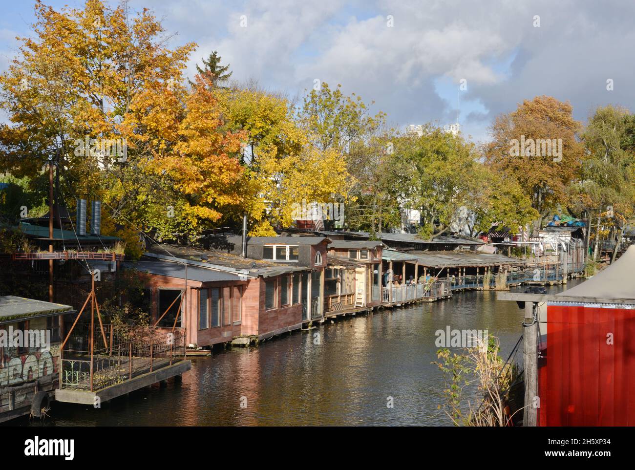 Berlin, Germany 10-23-2021 improvisied shacks and huts on the Flutgraben canal in Kreuzberg Stock Photo