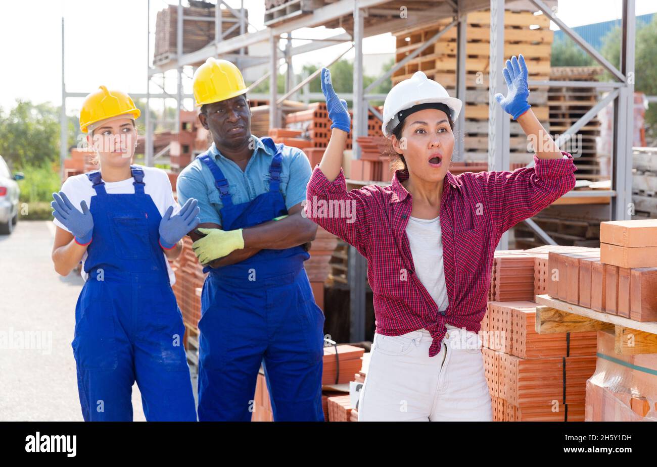 Workers have problems at work at a hardware store Stock Photo