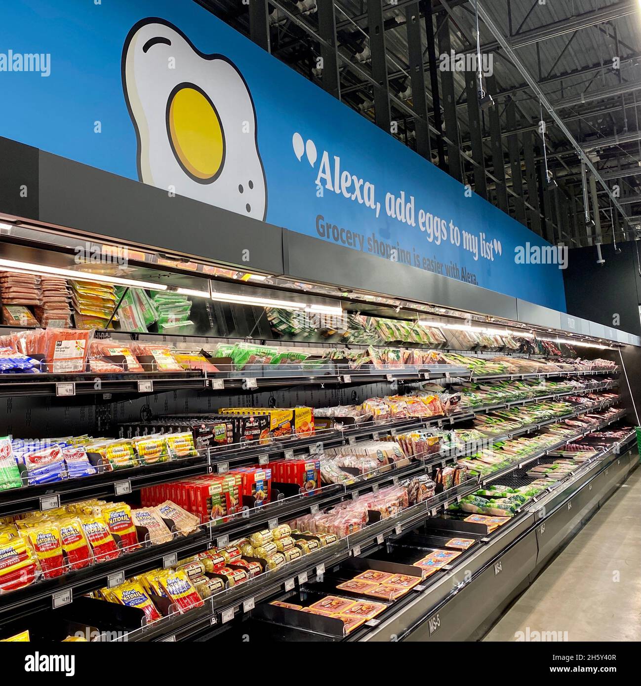 Refrigerated meat and poultry section inside an Amazon Fresh store