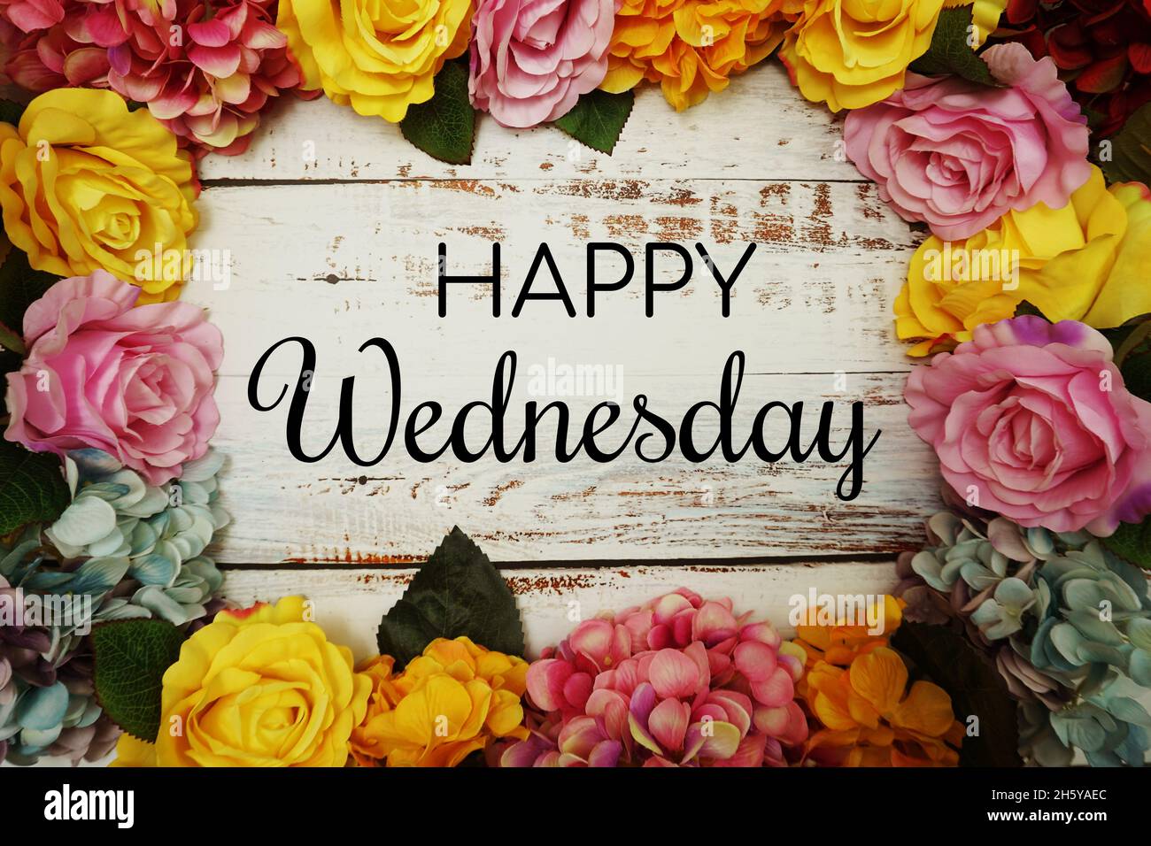 Happy Wednesday text and Flowers Colorful Border Frame on wooden ...