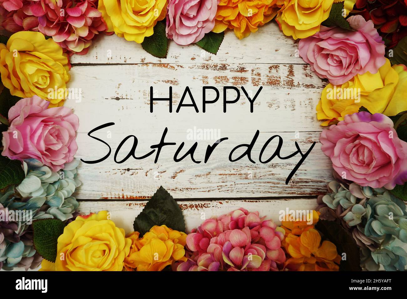 Happy Saturday text and Flowers Colorful Border Frame on wooden ...