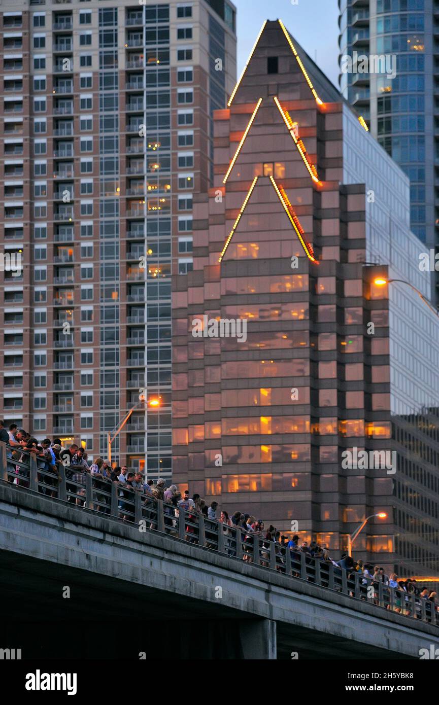 Spectators on the Ann W Richards Congress Ave Bridge viewing bats leaving for their nightly