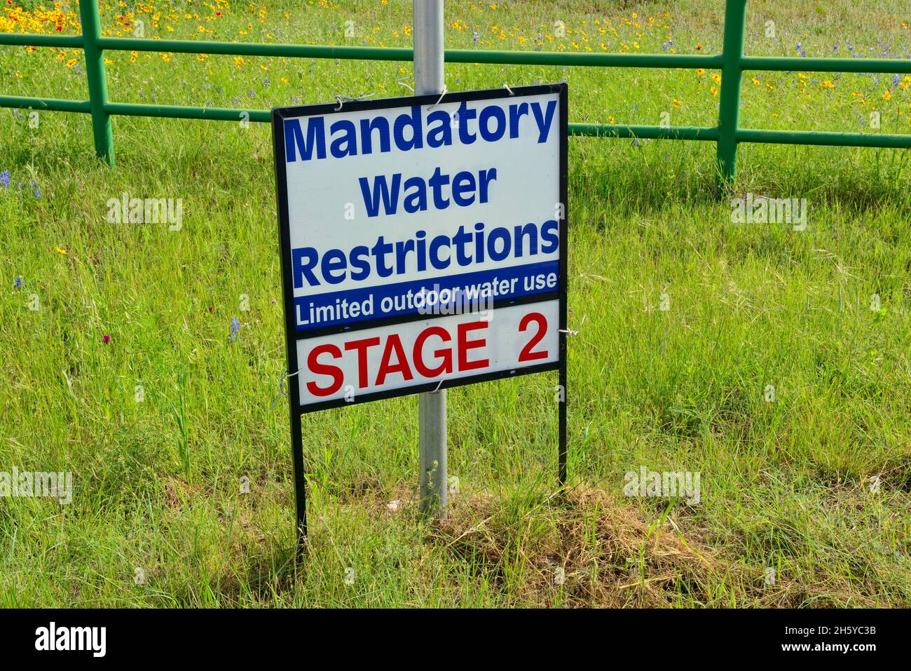 Water restriction sign, Llano County, Texas, USA Stock Photo