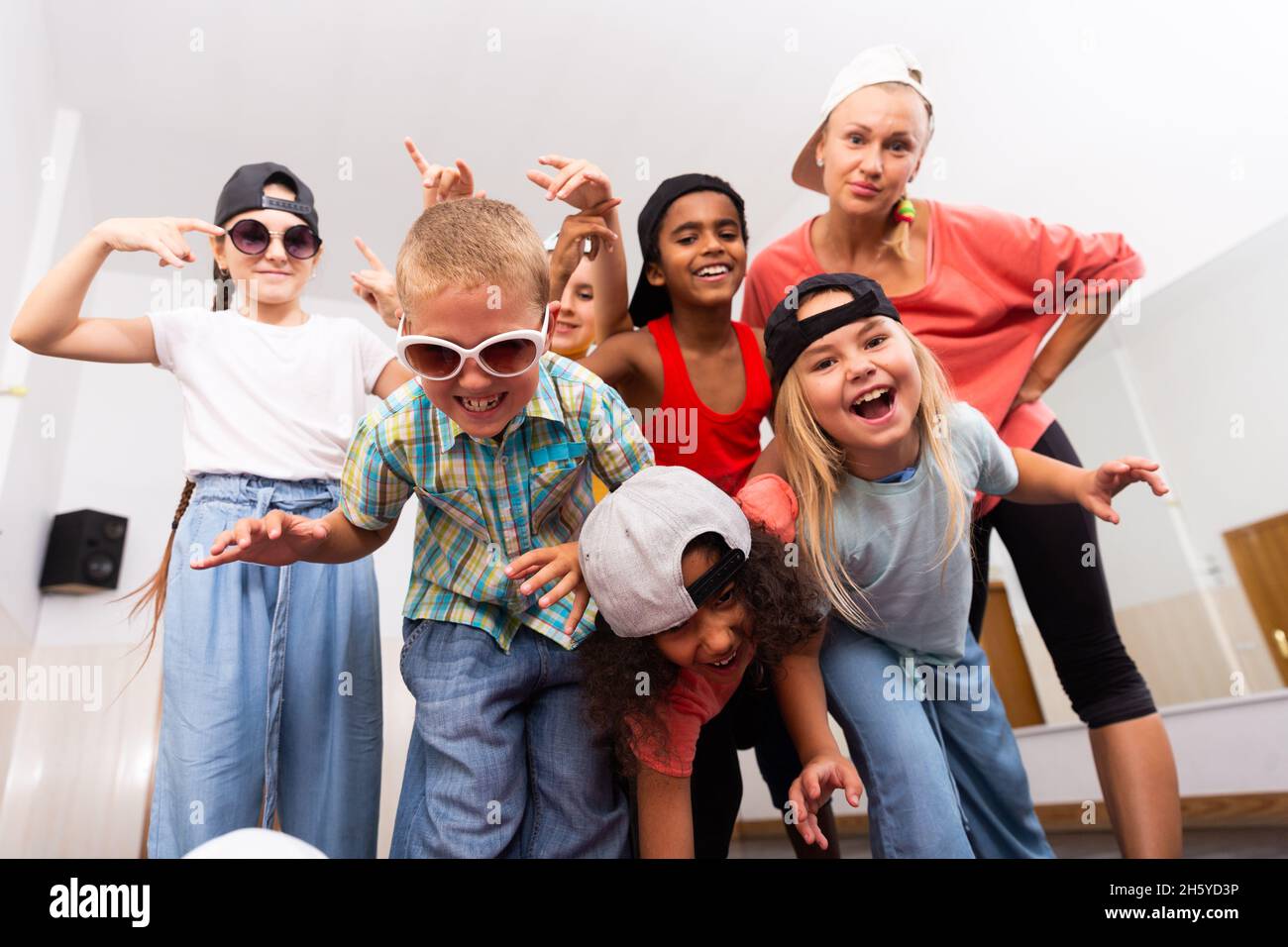 Kids hip hop dancers posing in studio Stock Photo - Alamy