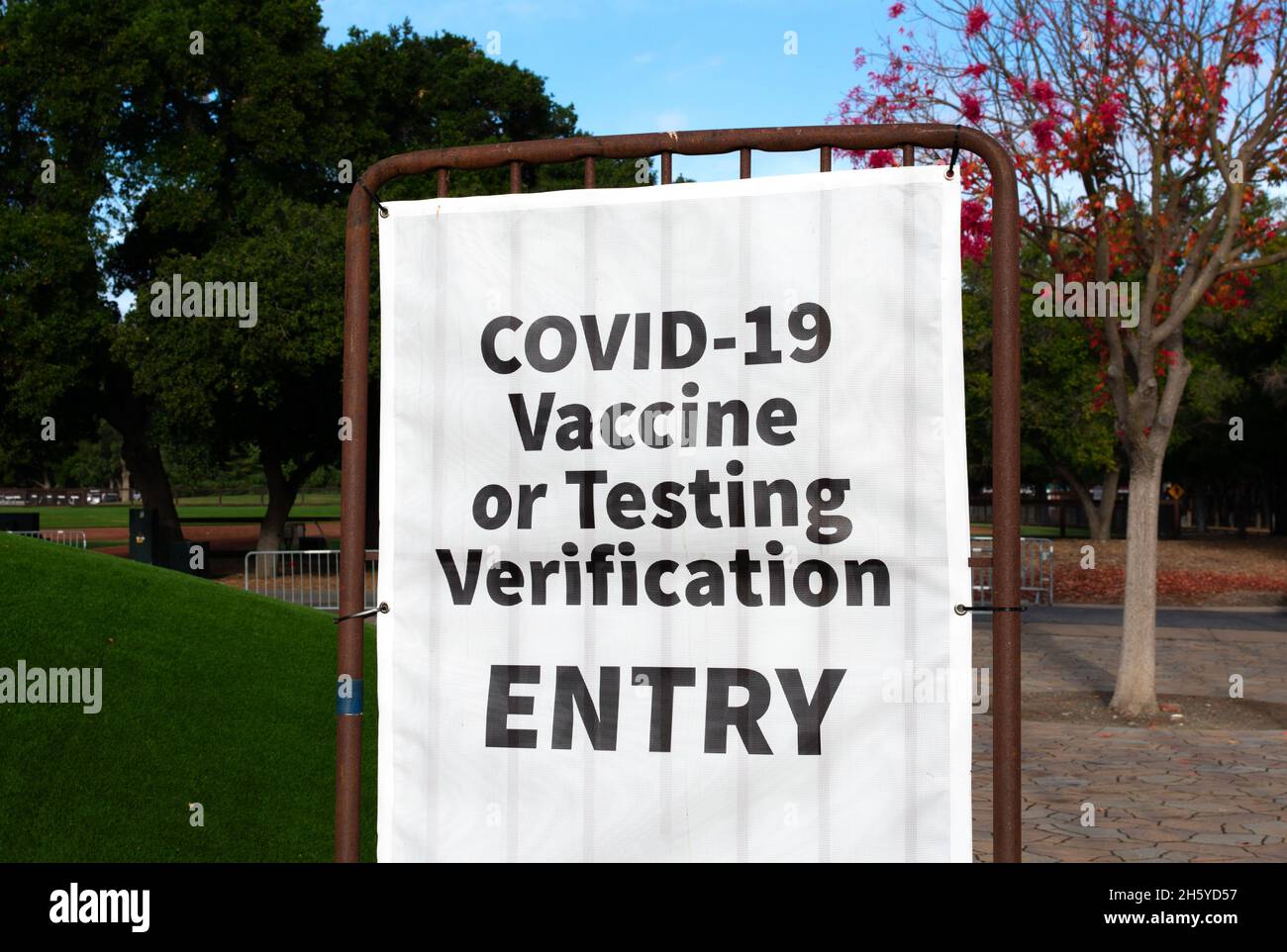 Covid-19 Vaccine or Test Verification sign at the entrance to public event, concert or stadium Stock Photo