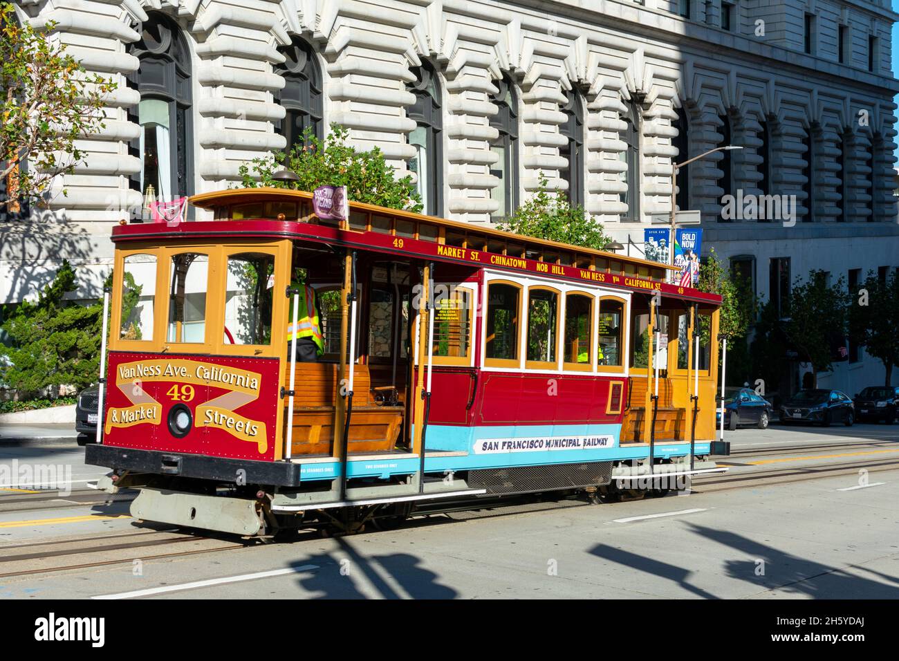 Cable car of California Street line on a steep street - San Francisco, California, USA - November, 2021 Stock Photo