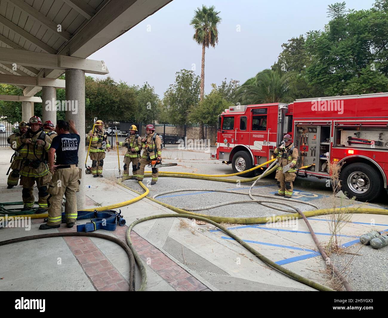 San Bernardino County Fire crew at commercial fire and rescue ca. 8 ...