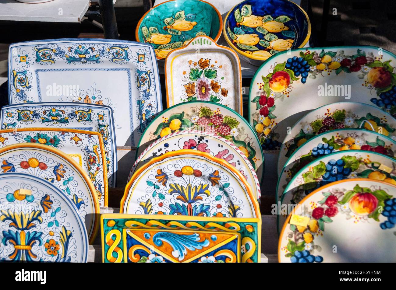 Handmade and handpainted Italian ceramics glow in the morning sun in