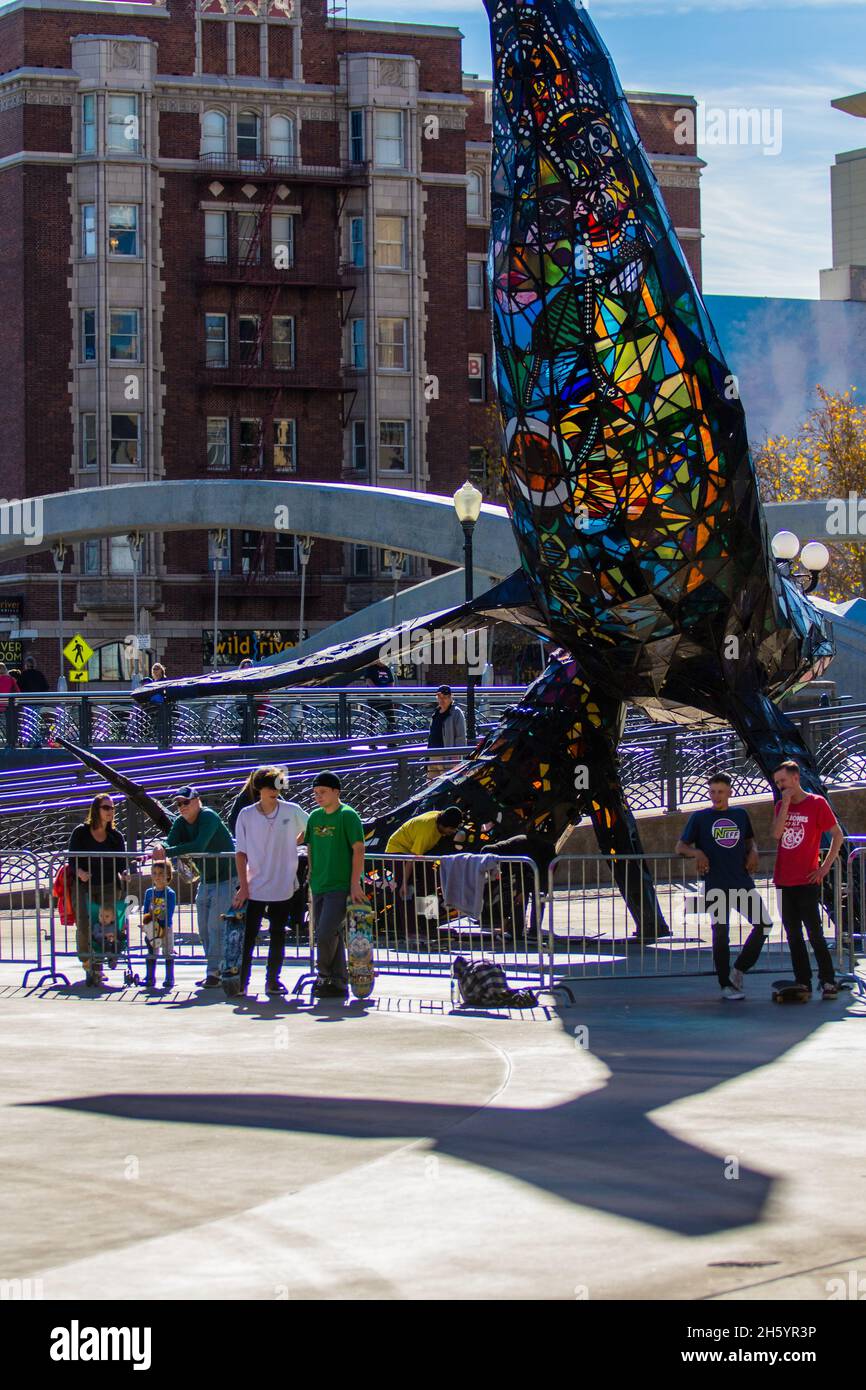 Reno, United States. 11th Nov, 2021. Skateboarders seen at the city plaza below a piece of public art. The city has opened a temporary skate park in downtown. The area has long been used as unofficial skate park by locals. (Photo by Ty O'Neil/SOPA Images/Sipa USA) Credit: Sipa USA/Alamy Live News Stock Photo