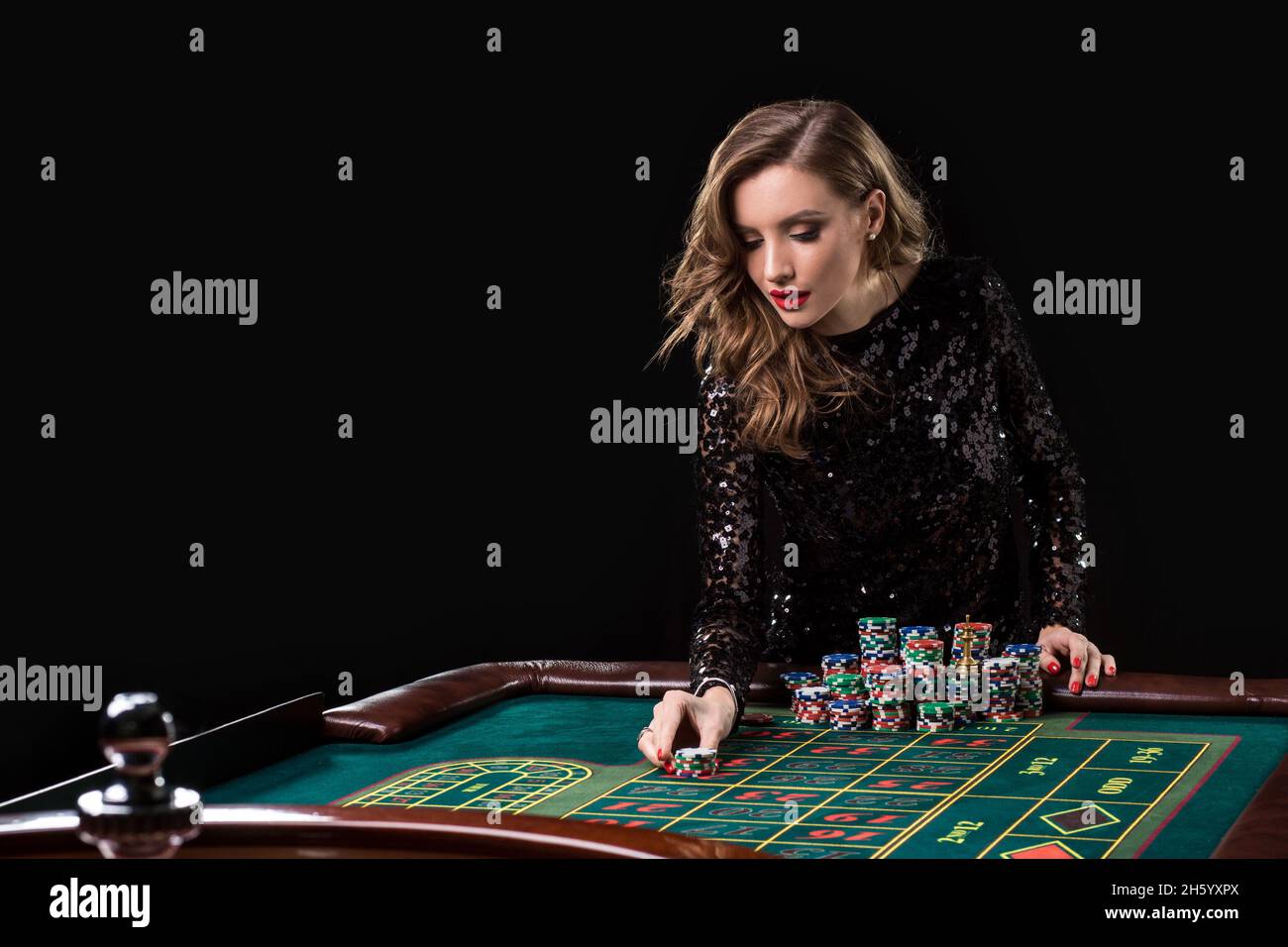 Casino girl holding chips hi-res stock photography and images - Page 7 -  Alamy