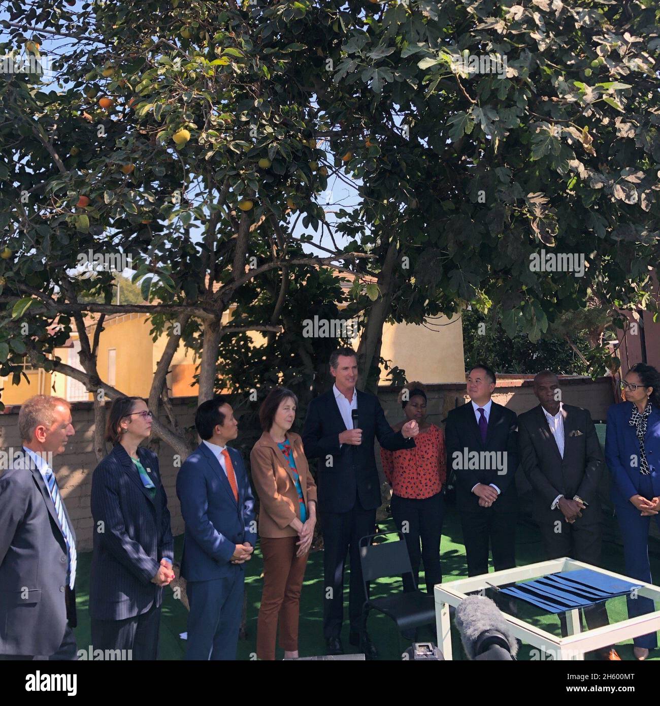 Gavin Newsom signing Housing Crisis Act of 2019 at Nancy Skinner's