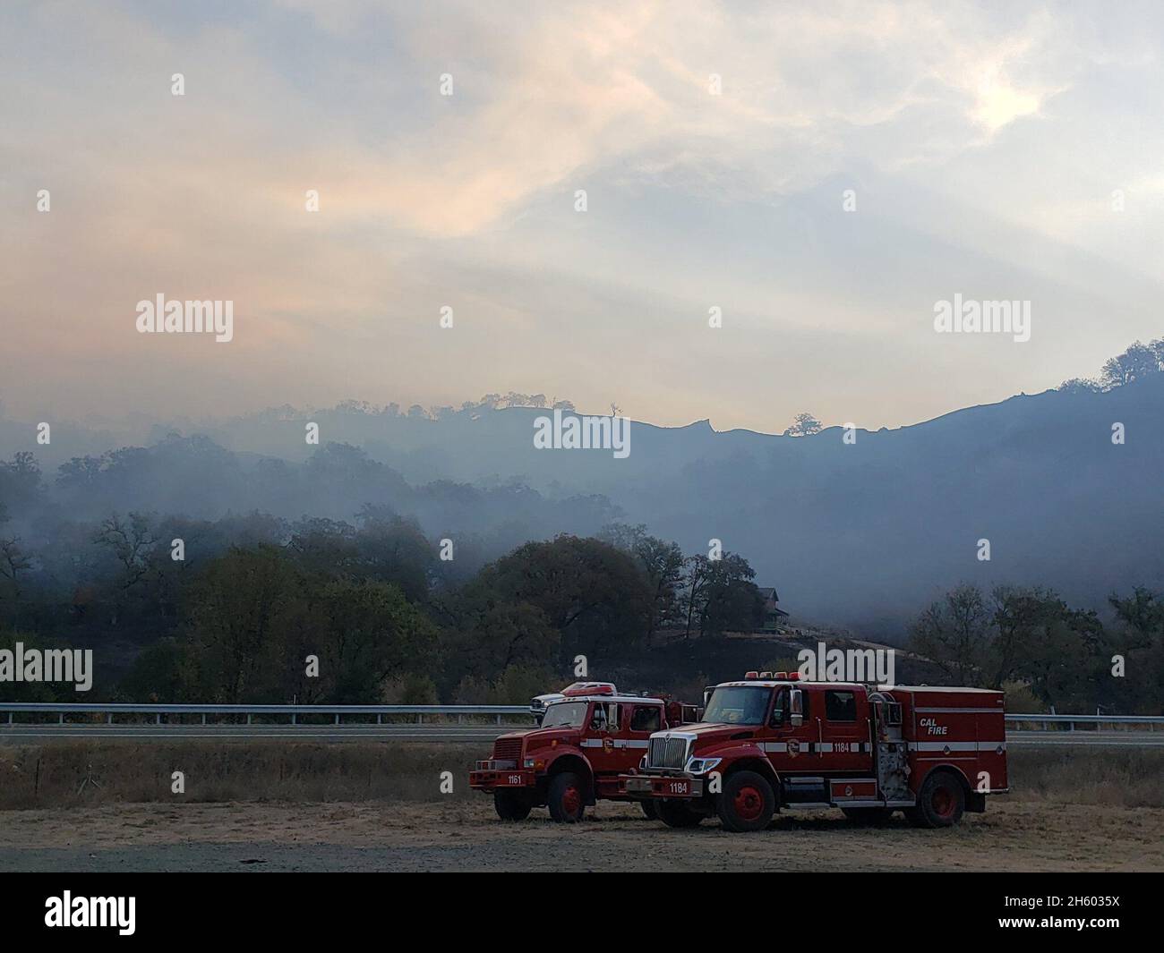 Burris Fire: The outstanding efforts fire resources overnight, and a break from high winds aided in supression efforts ca. 27 October 2019 Stock Photo