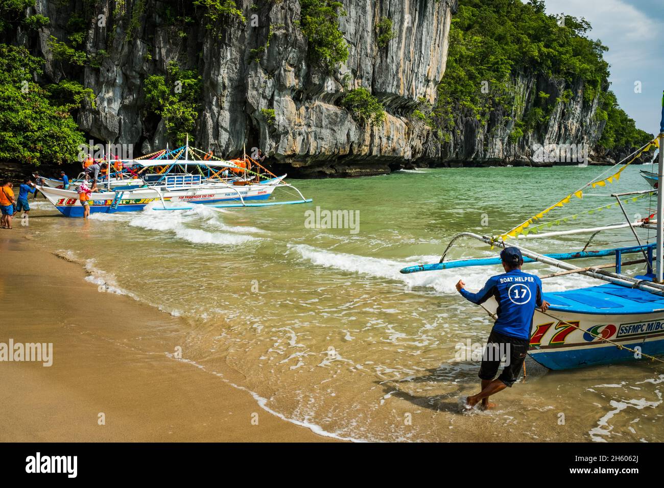 July 2017. Ecotourism at the Subterranean River, a coastal cave with kilometers of navigable water and that is recognized as one of the seven natural wonders of the world, provides an economic alternative to traditional forest livelihoods. Sabong Beach, Puerto Princesa, Palawan, Philippines. Stock Photo