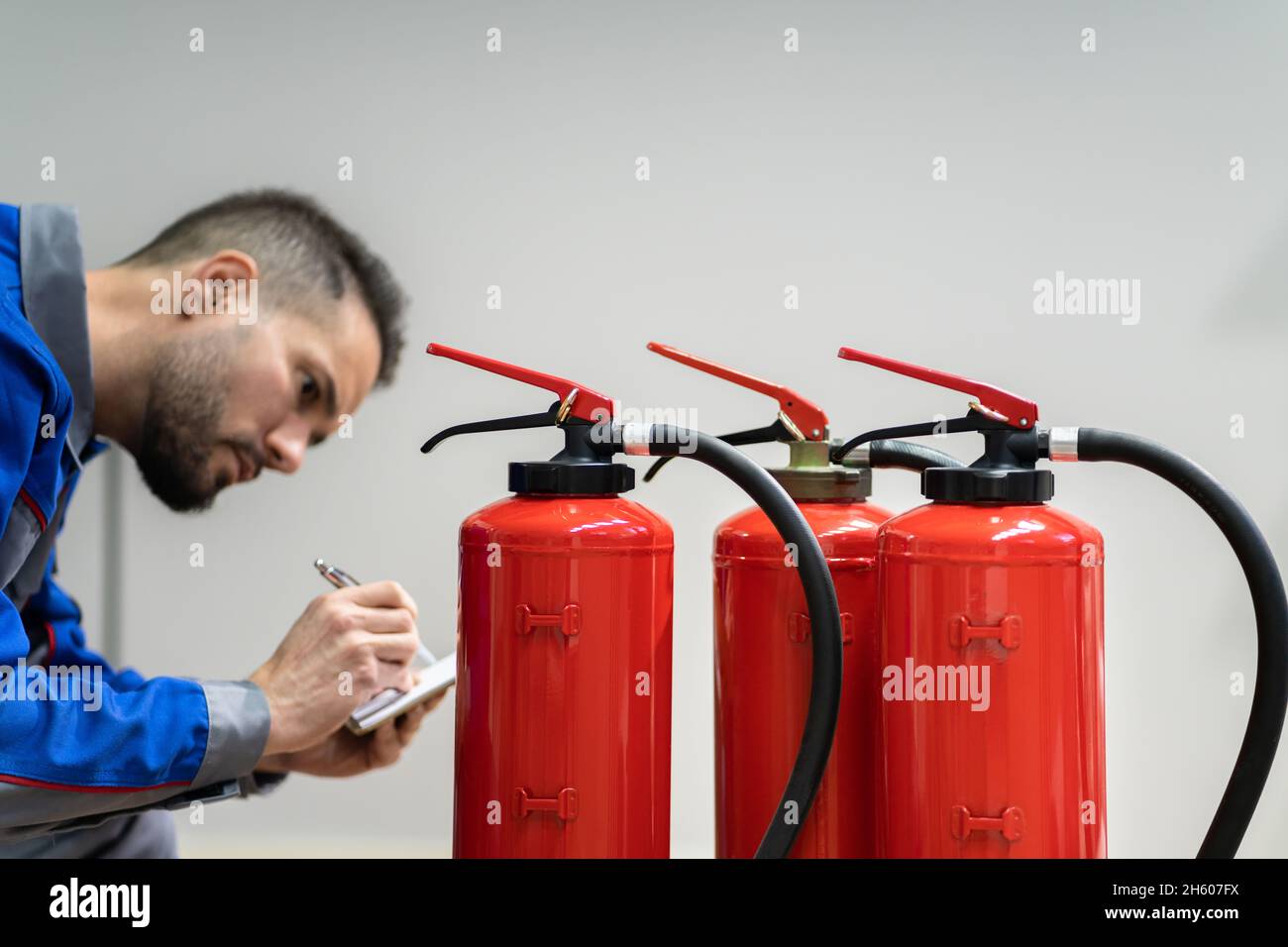 Fire Extinguisher Safety Prevention Check. Emergency Equipment Inspection Stock Photo Alamy