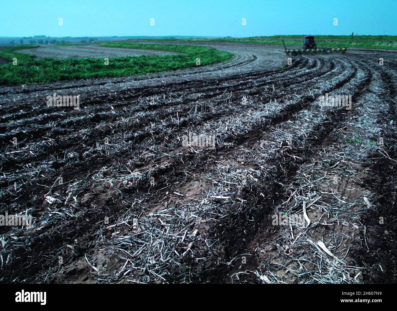 Planting no-till corn in soybean residues on a farm in Plymouth County ca. 2011 or earlier Stock Photo