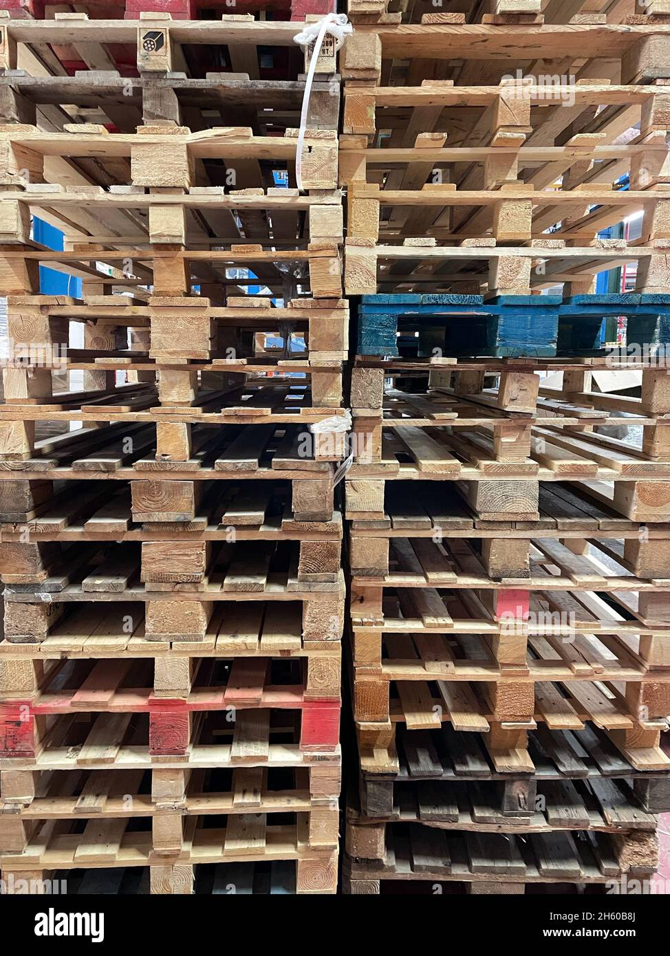 Rows of wooden pallets used in warehouses Stock Photo Alamy