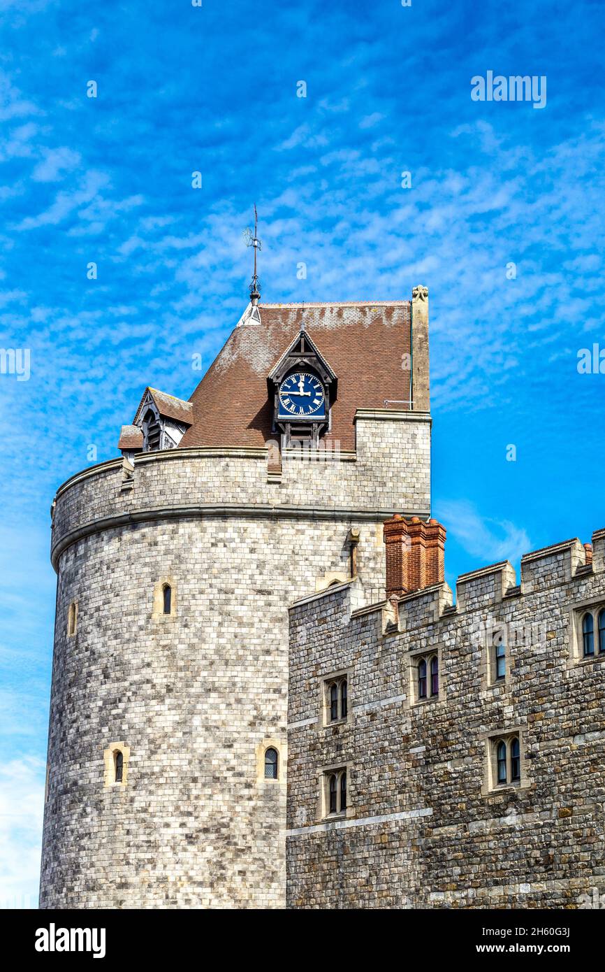 Clock on the exterior of the royal residence, medieval 11th century Windsor Castle, Windsor, Berkshire, UK Stock Photo
