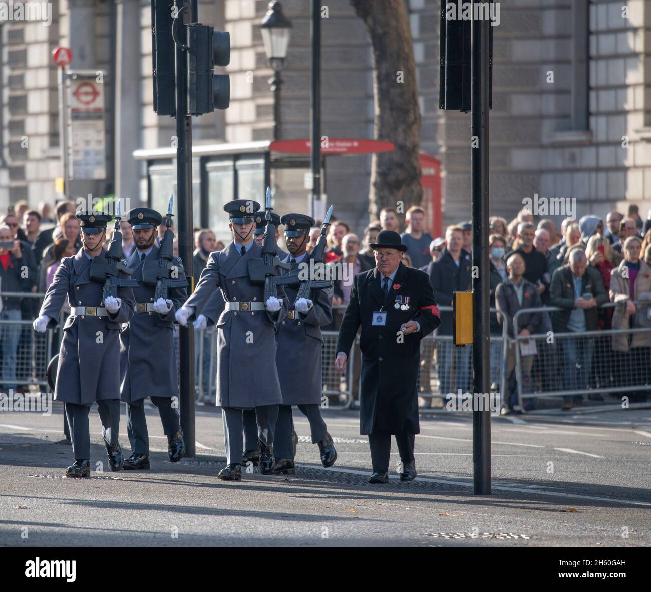 London, UK. The Western Front Association Annual Service of Remembrance takes place at The Cenotaph in Whitehall on 11 November 2021, attracting large crowds who come to pay their respects on a sunny Autumn day. The Royal Air Force Regiment Vigil Party make their way to The Cenotaph. Credit: Malcolm Park/Alamy Stock Photo