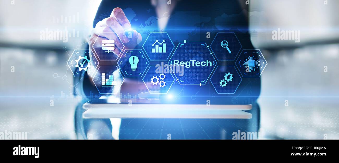 Regtech Regulation and supervision technology concept on virtual screen. Stock Photo