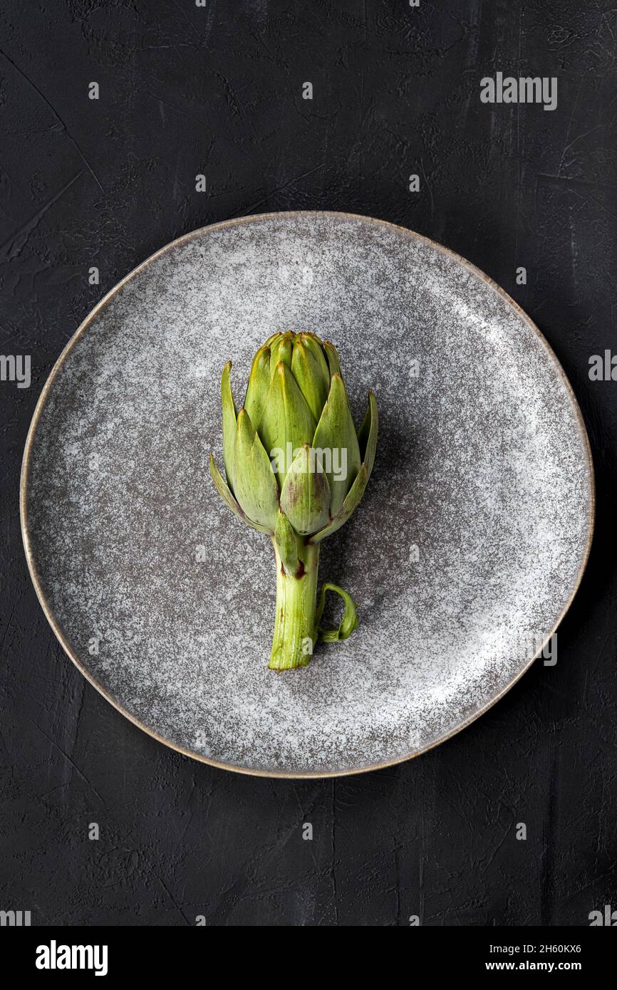 Artichokes on a plate. Stock Photo