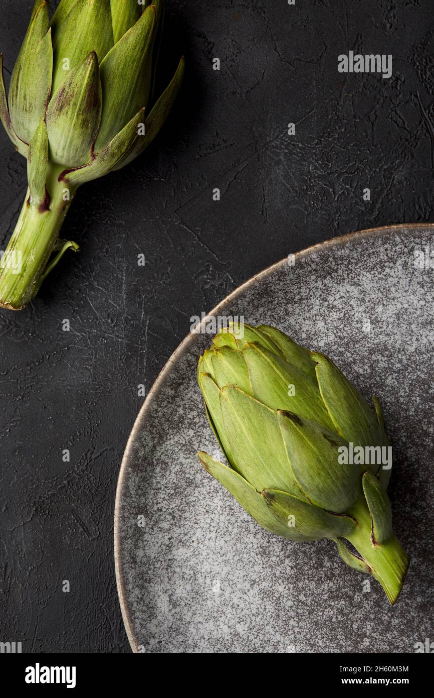 Artichokes on a plate. Stock Photo