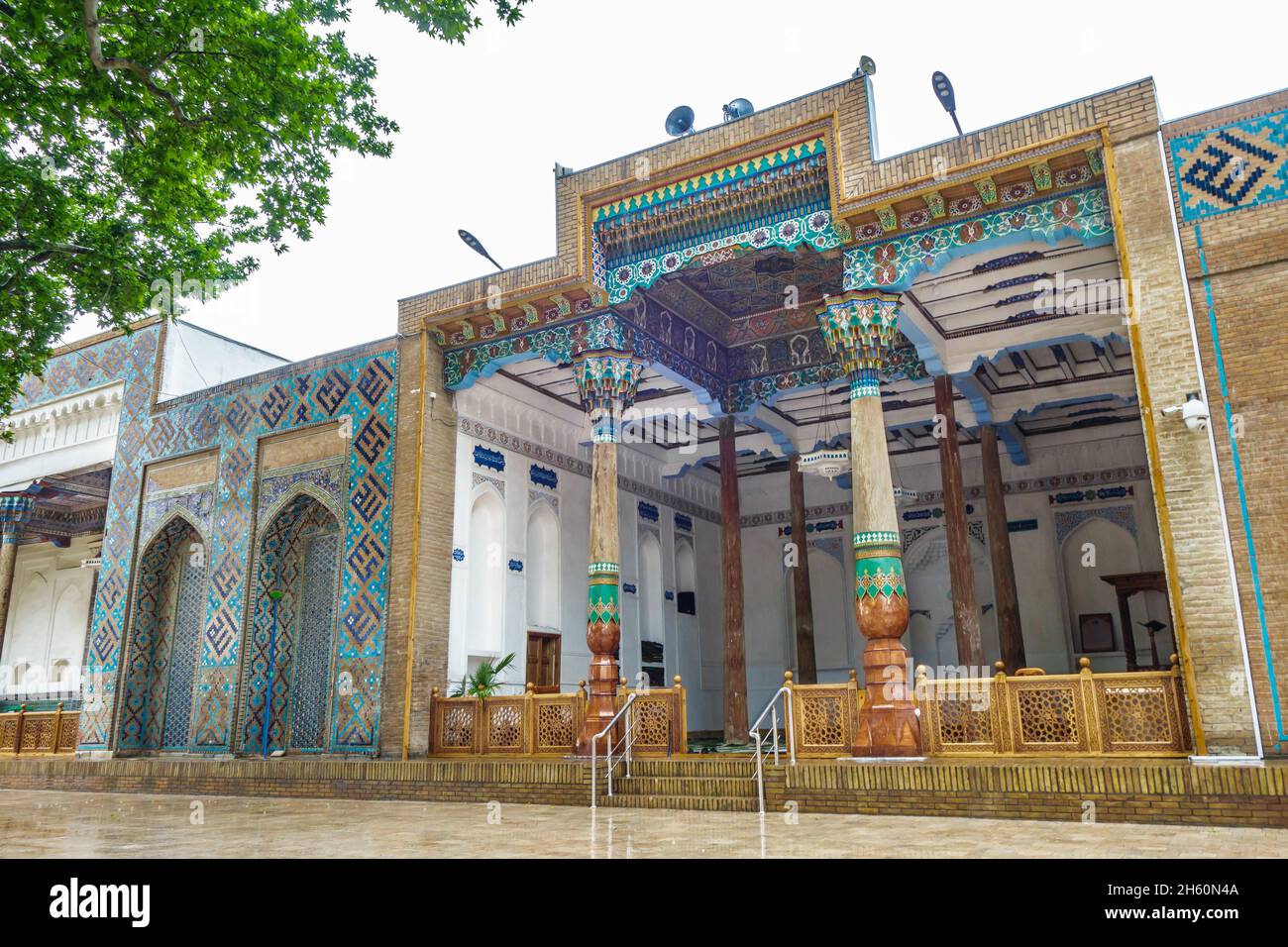 Facade of Khoja-Ahrar mosque in Samarkand, Uzbekistan. Mosque is of summer type so entrance to prayer hall is open directly from street. Building of m Stock Photo
