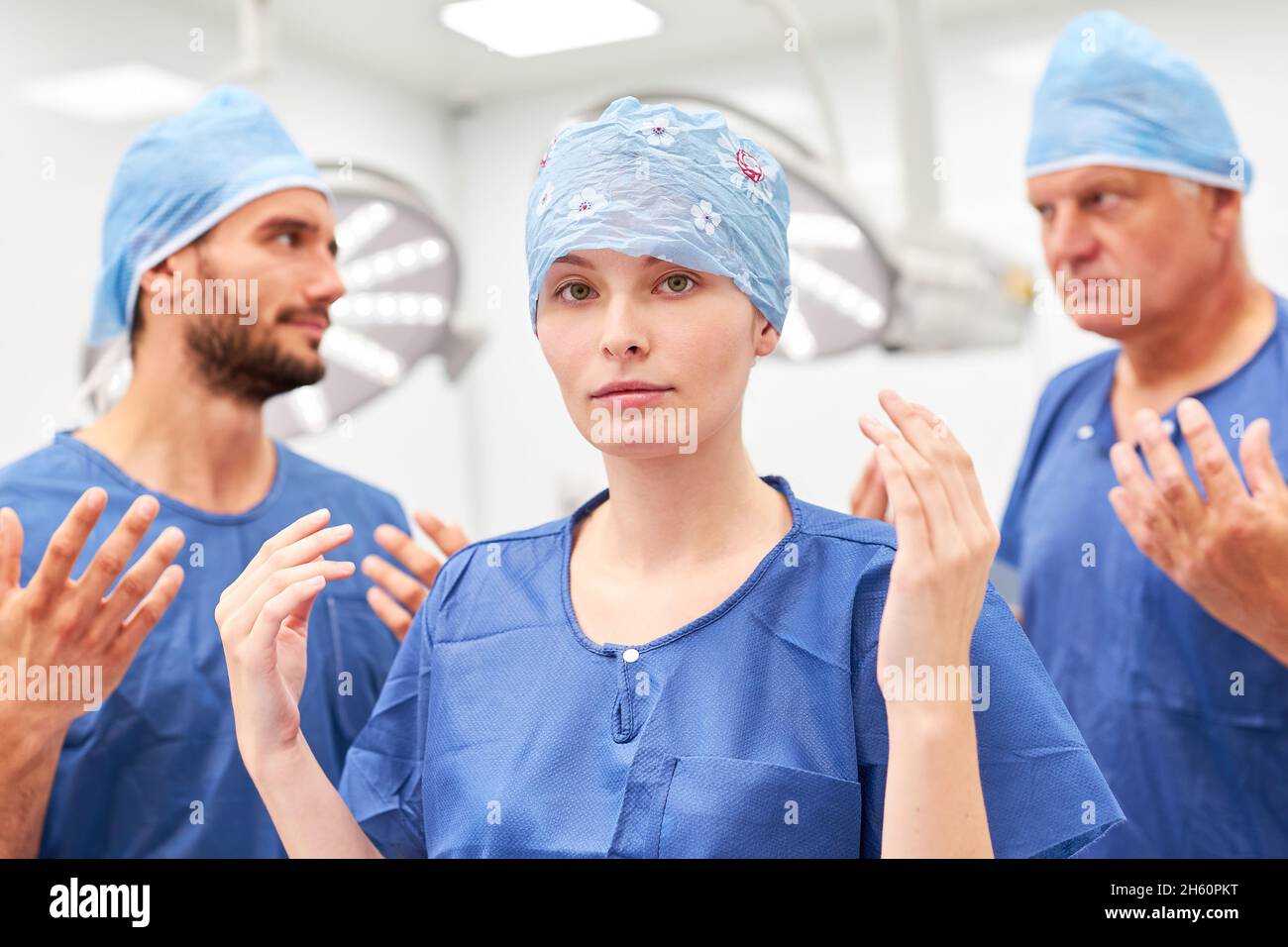 Medical team in coat hi-res stock photography and images - Alamy
