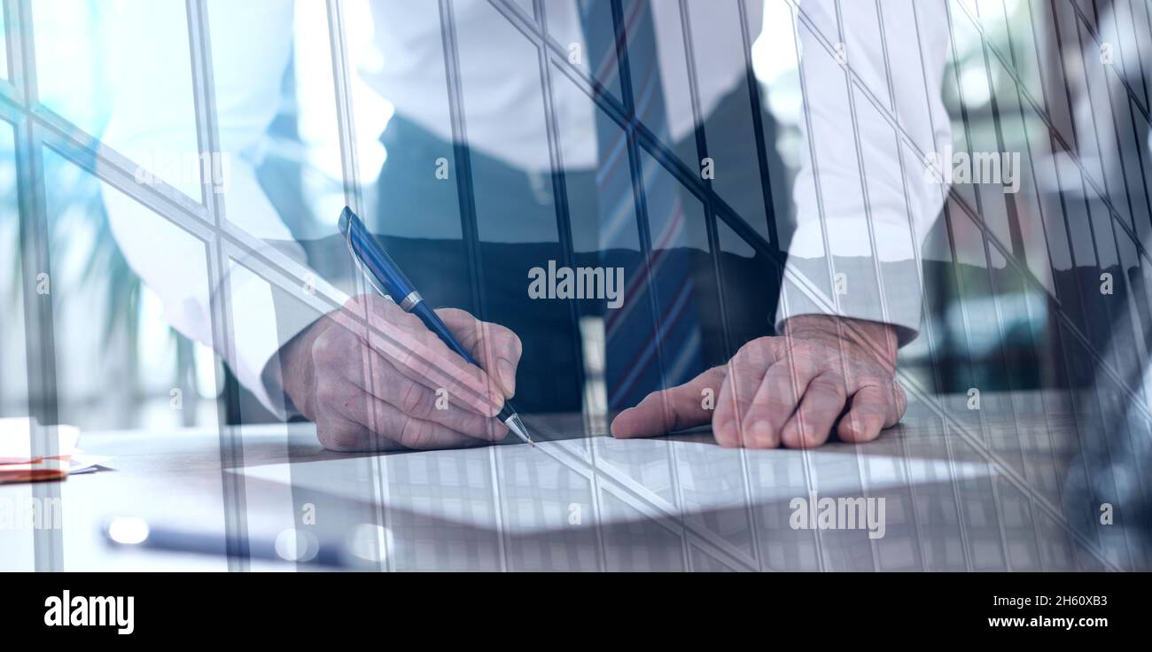 Businessman signing a document in office, double exposure, light effect ...