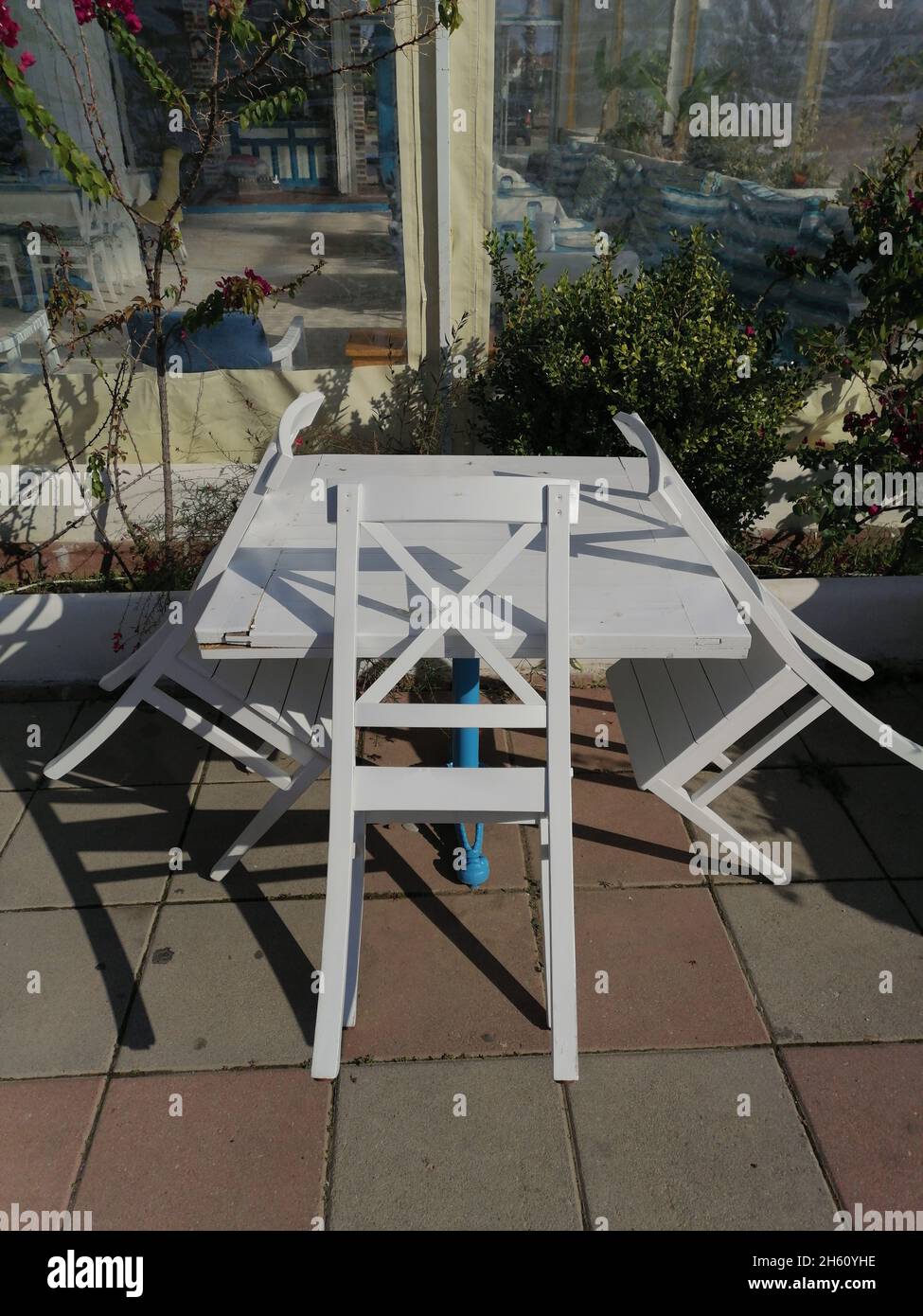 Furniture stacked up in closed cafe during lockdown. Stock Photo