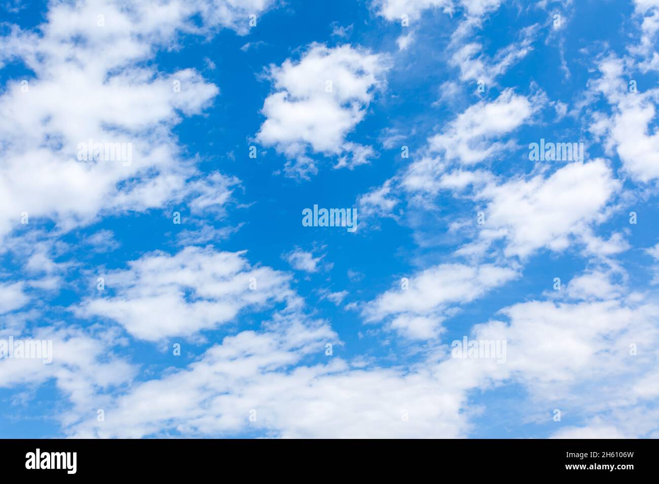 Fast moving clouds in the blue sky, may be used as background Stock Photo