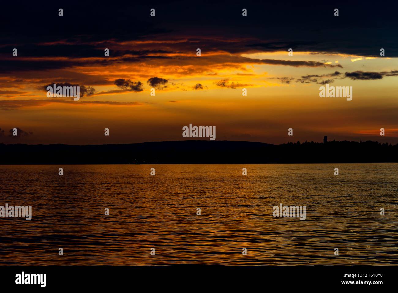 Beautiful view of the cloudy sunset sky over a sea Stock Photo - Alamy