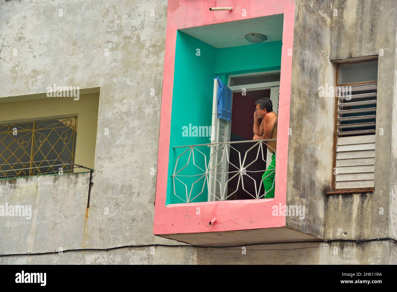 Street scene in central Havana.  Second storey balcony, La Habana (Havana), Habana, Cuba Stock Photo
