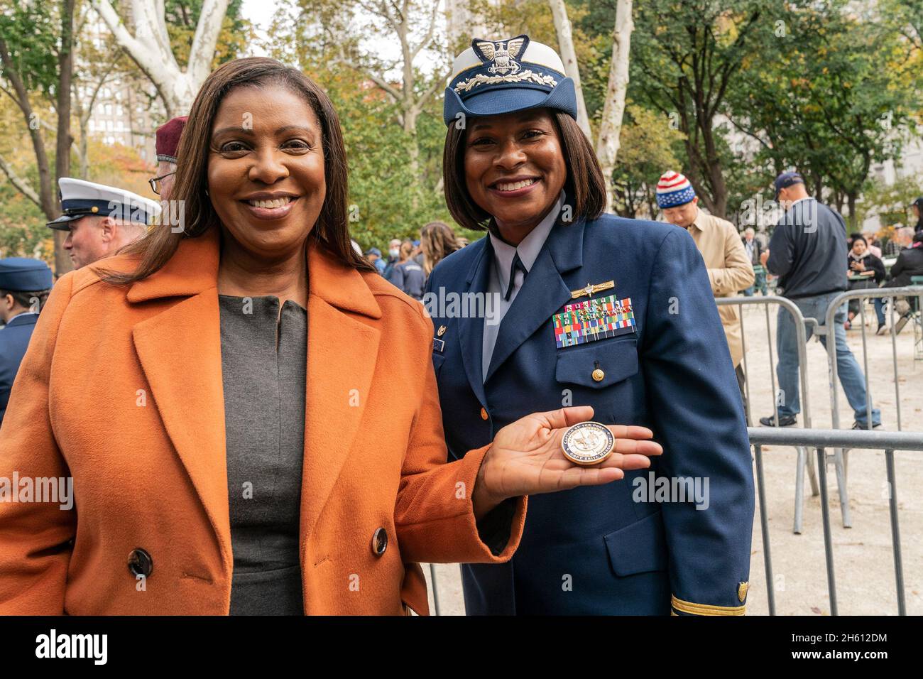 New York, USA. 11th Nov, 2021. State Attorney General Letitia James and US Coast Guards captain Zeita Merchant attend Wreath Laying ceremony on Veterans Day on Madison Square Park. James displays medal given by Captain Merchant. In 2020 the ceremony and floowing parade were canceled because of COVID-19 pandemic. The nation's largest celebration of veterans in the largest city in America once again was held in person on Veterans Day. (Photo by Lev Radin/Pacific Press) Credit: Pacific Press Media Production Corp./Alamy Live News Stock Photo