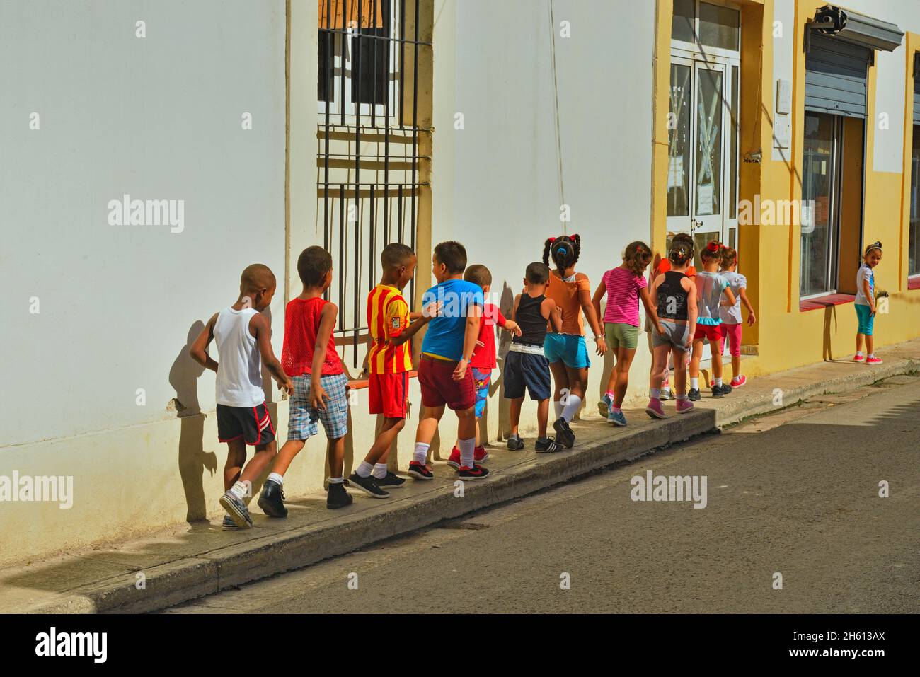 Street scene in Old Havana- First grade schoolchildren, La Habana (Havana), Habana, Cuba Stock Photo