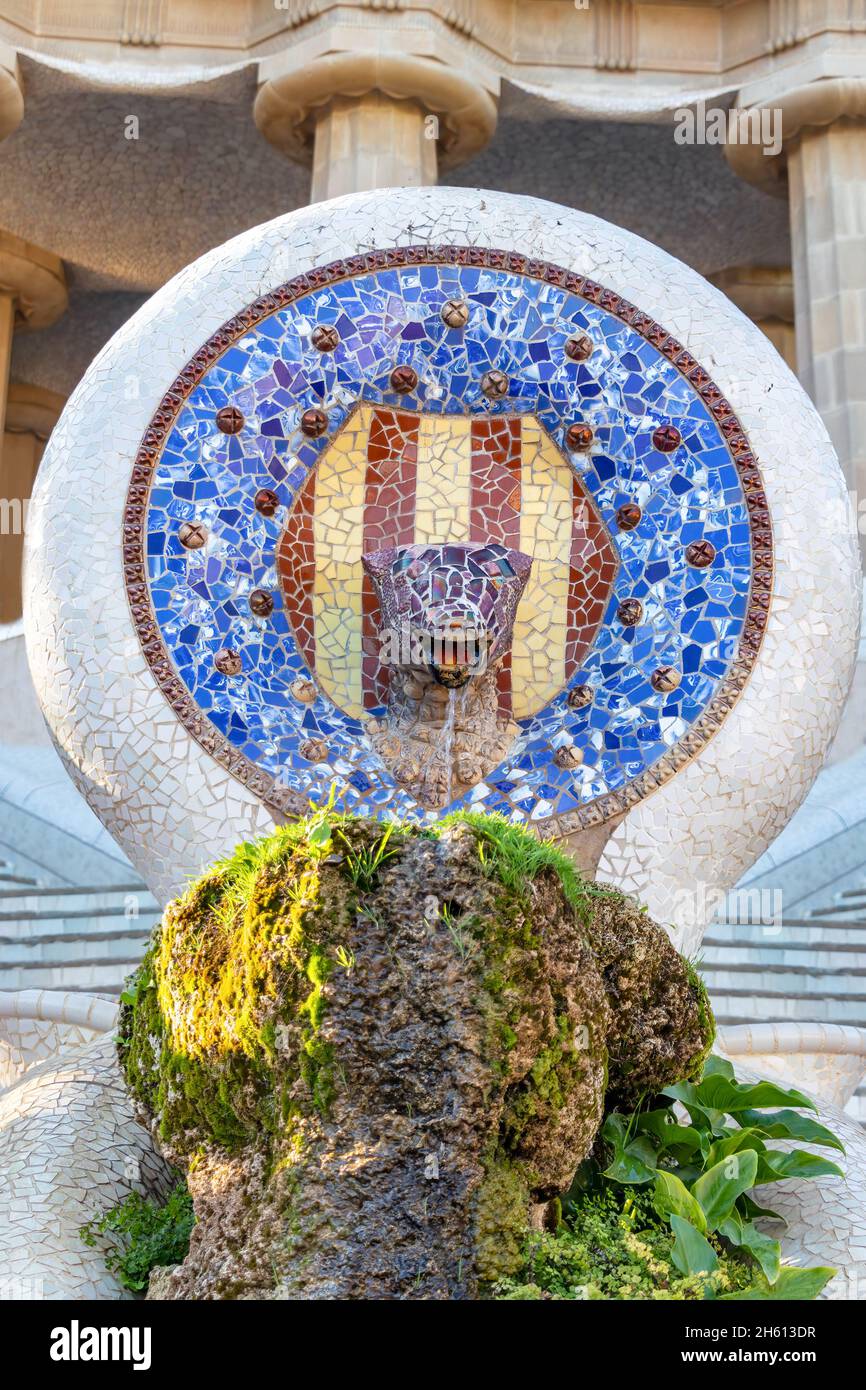 Mosaic fountain in Park Guell. Mosaic sculpture in the Parc Güell designed by Antoni Gaudí located on Carmel Hill, Barcelona, Spain. Stock Photo
