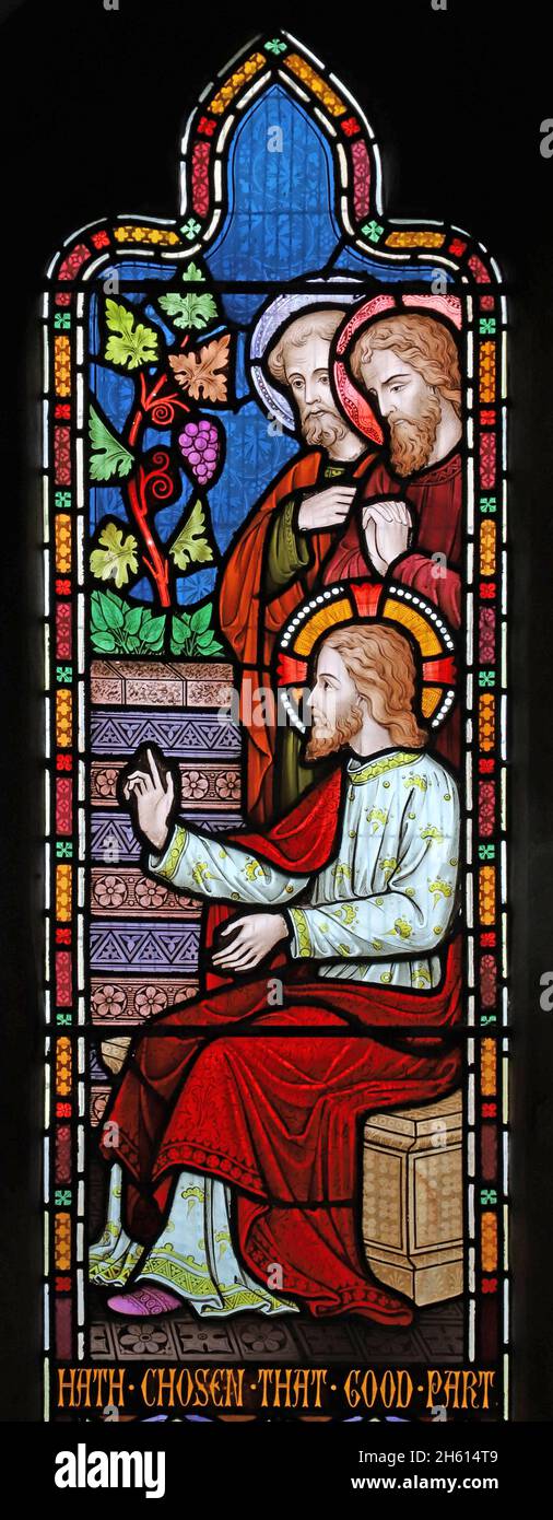 A stained glass window by Frederick Preedy depicting Jesus in the house of Martha & Mary, St Andrew's Church, Cleeve Prior, Worcestershire Stock Photo