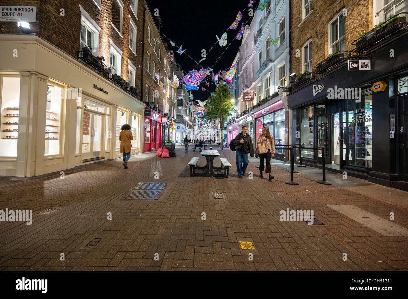 LONDON NOVEMBER 1, 2021 Shoppers on Carnaby Street with the
