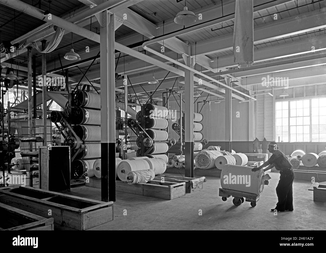 Worker inside a factory in Ware Shoals, South Carolina; 1932 Stock